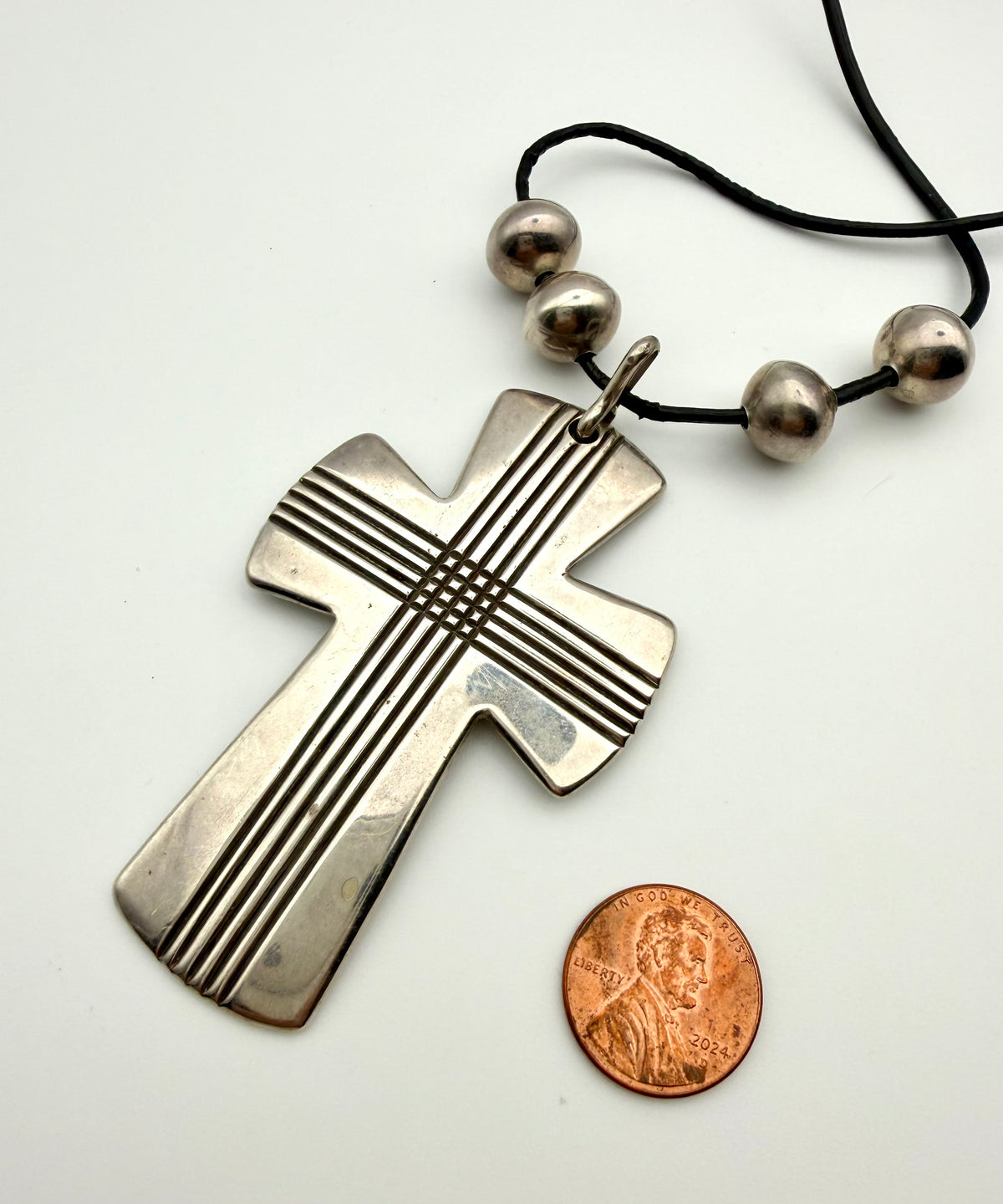 Large Sterling Silver Cross on Cord with 4 Silver Small Balls  ￼